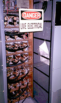 Photo 4 - DC BUS and rectifier in a high-rise tenant space. Vaporizing copper BUS bars can explode with the same expansion rate as dynamite.