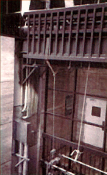 Photo 5 - Data electrical feeds traverse a bridge into the rear of a high-rise office building.